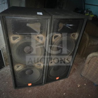 Lot of 2 JBL JRX125 dual 15-inch passive speakers, black. Visible wear. Sold as is.