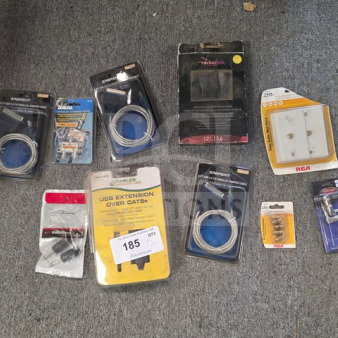 Lot of miscellaneous cables and adapters, including brands like Sabrent and RCA, in original packaging. Assorted types and conditions.