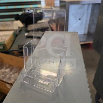 Clear acrylic brochure and business card holder in good condition, showcases a sleek design for office or retail display.