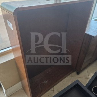 Wood host station with smooth finish, open front design, and sturdy build. Minor scuffs visible, ideal for restaurant use.