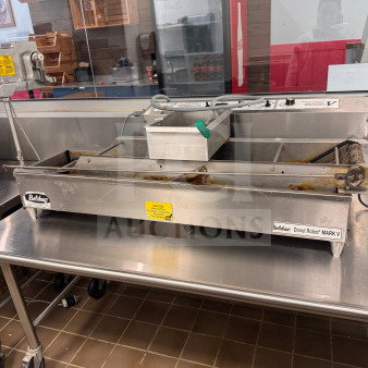 Belshaw Donut Robot® Mark V Automatic Donut Fryer, used, good working condition, with custom stainless steel stand.