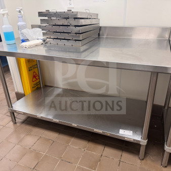 60" stainless steel commercial kitchen work table with backsplash, lower shelf, and polished surface. Contents not included.