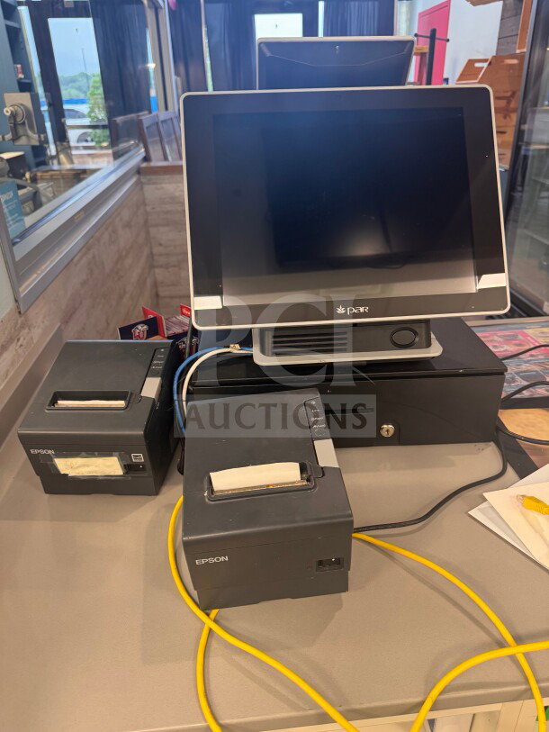 Point of Sale (POS) system with PAR monitor, cash drawer, three Epson receipt printers, and payment terminal. Untested.