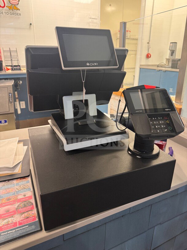 Point of Sale system with cash drawer, three receipt printers, and payment terminal. Untested; power cables included. Sold as-is.