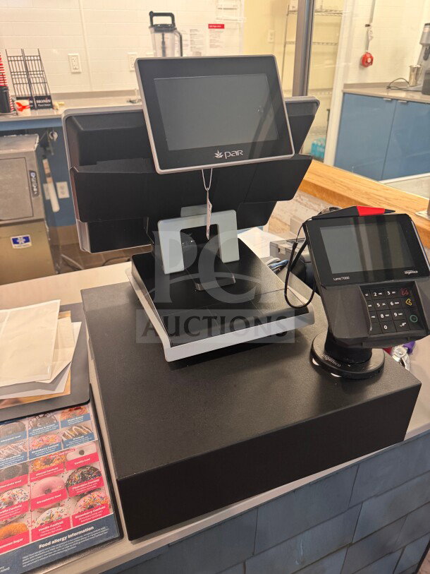 POS system with cash drawer, three receipt printers, payment terminal. Untested, sold as-is. Includes power cables and cords.