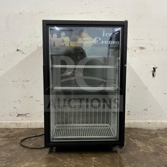 Countertop display freezer with glass door, two wire shelves, and "Ice Cream" label. Used condition, black frame.