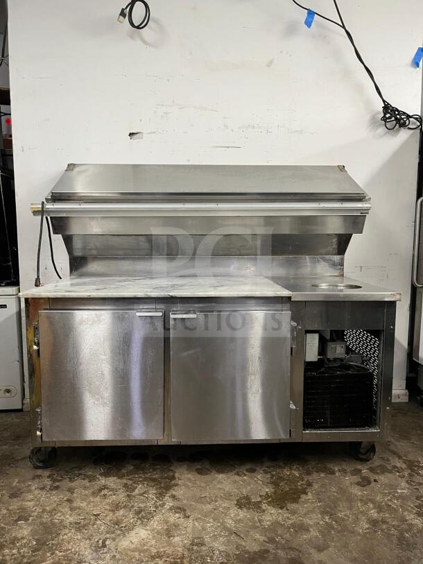 Marsal & Sons steel refrigerated pizza prep table, model "pizza prep," features dual cabinets and integrated refrigeration.