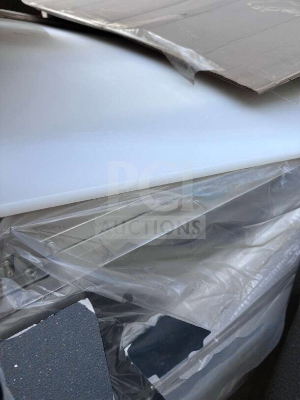New KoolMore KM-RPPS-3DSS 72" refrigerated pizza prep table in packaging, pristine condition, fully operational.