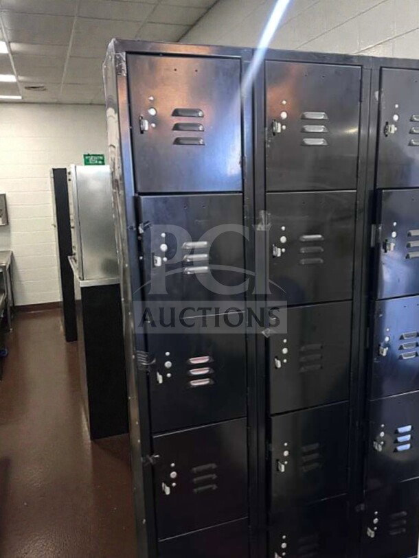 Industrial Steel Fabrication 12-door steel locker cabinet, heavy duty metal, premium condition, suitable for commercial use.