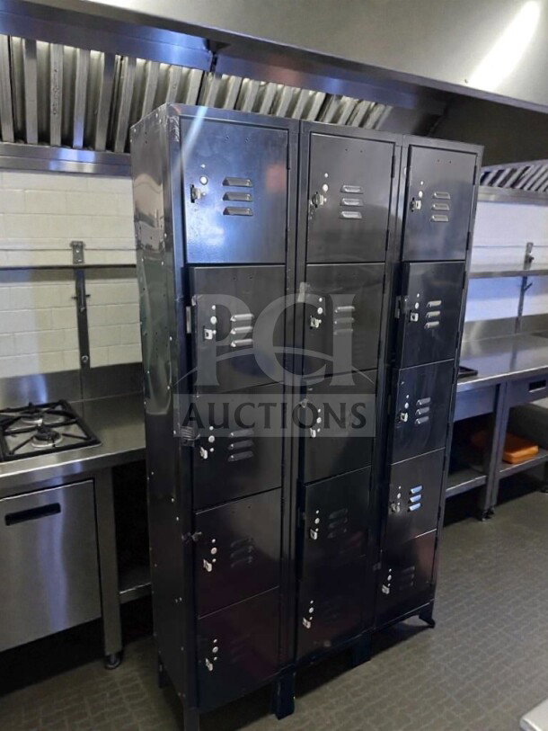 Industrial Steel Fabrication 12-door steel locker cabinet in premium condition, ideal for commercial or facility use.