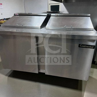 Continental Refrigerator SW60N12, 60" refrigerated prep table in superior condition; 2-door with stainless steel finish.