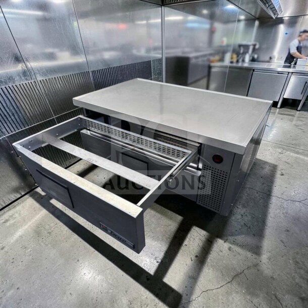 True TRCB-52-HC Refrigerated Chef Base, 52" width, 2 drawers, stainless steel, excellent condition, model tag visible.