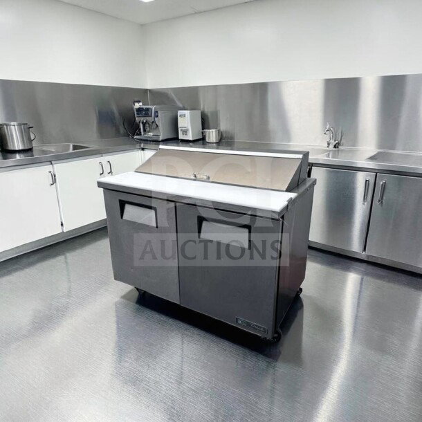 True TSSU-48-12-HC prep table, 48-inch, excellent condition, refrigerated base, fully tested, stainless steel exterior.