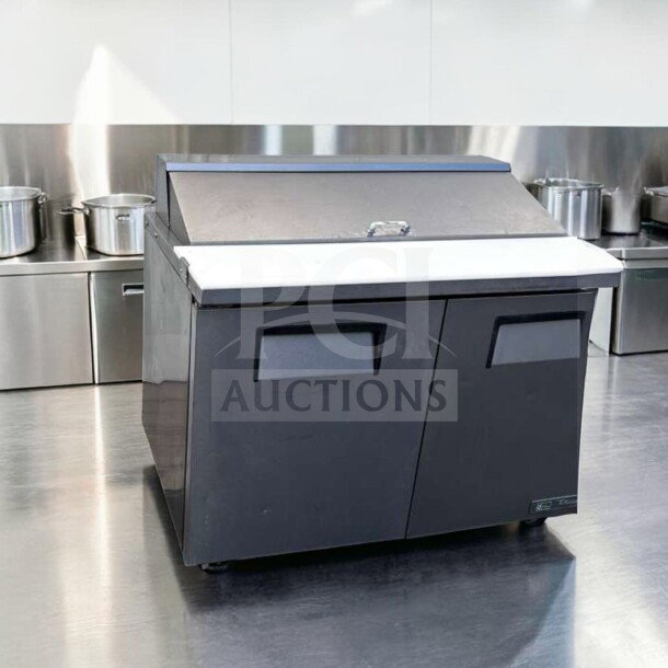 True TSSU-48-12-HC prep table, 48", refrigerated base, top-tier condition, stainless steel, fully tested, operational.