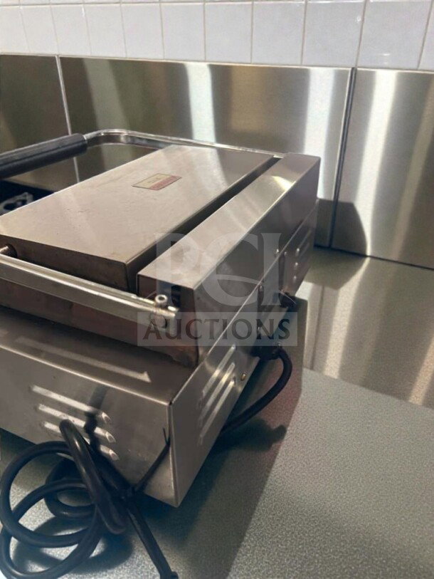 Adcraft countertop panini grill in excellent condition, stainless steel, UL Listed, model ADC-S-GRILL-0560, fully tested.