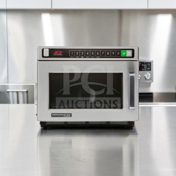Amana MDC182 Menumaster 1800W commercial microwave in exceptional condition, operational, 208-240V, front panel visible.