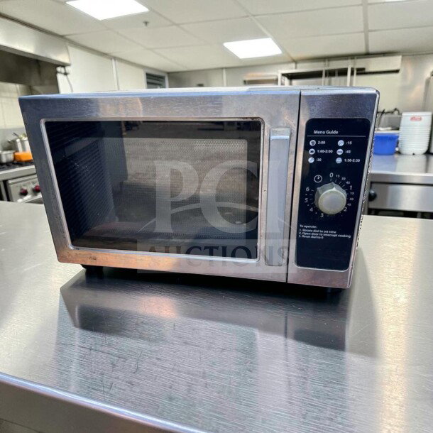Amana RCS10DS Commercial Microwave Oven in exceptional condition, stainless steel, 1000W, tested, 120V, menu guide visible.