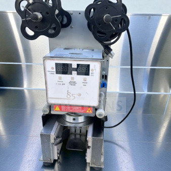 Commercial 85°C Digital Cup Sealer in excellent condition, fully tested, automatic operation, with control panel and dual rollers.