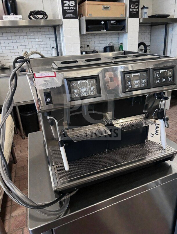 Grindmaster 1011-008 Pony Series espresso machine, two-group, 230V, ETL listed, fully operational, excellent condition.