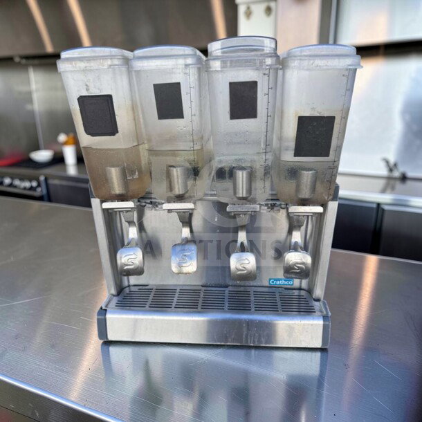 Crathco CS-4E-16-290 refrigerated drink dispenser with 4 pre-mix bowls, stainless steel body, fully tested, in superior condition.