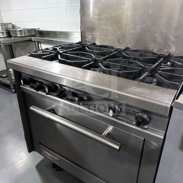 Connerton CN36-6_LP commercial gas range, 36" wide, six burners, stainless steel, oven base, excellent condition.