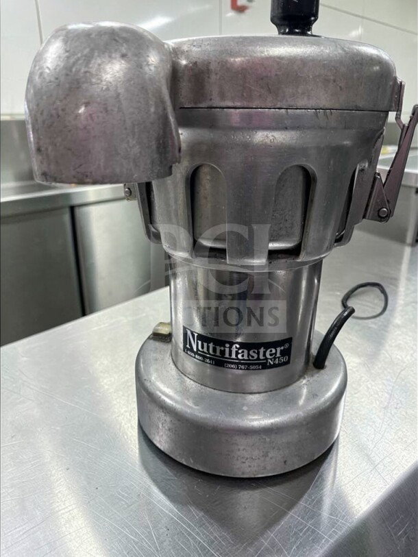 Nutrifaster N450 juicer, heavy-duty stainless steel, elite condition, fully tested, high-performance extractor.