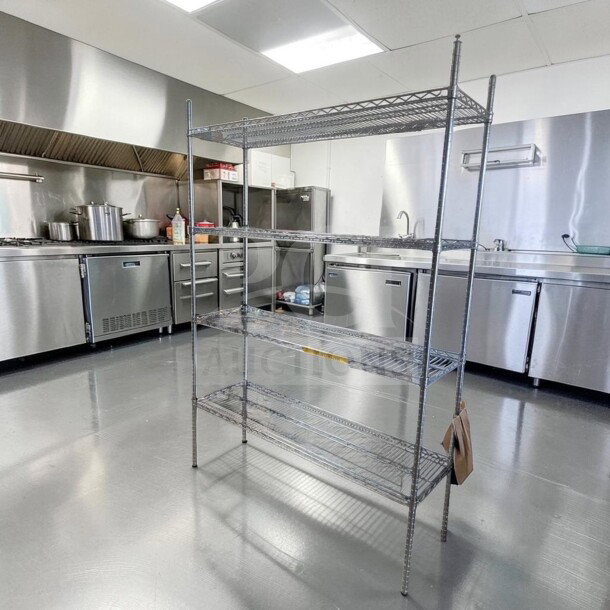 Commercial Aluminum Wire Shelving Rack, multi-tier, heavy-duty, prime condition, model COM-S-RACK-0913, in a kitchen.
