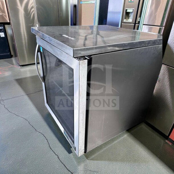 True TUC-27G-LP-HC~FGD01 low profile undercounter refrigerator, glass door, stainless steel, fully operational, excellent condition.
