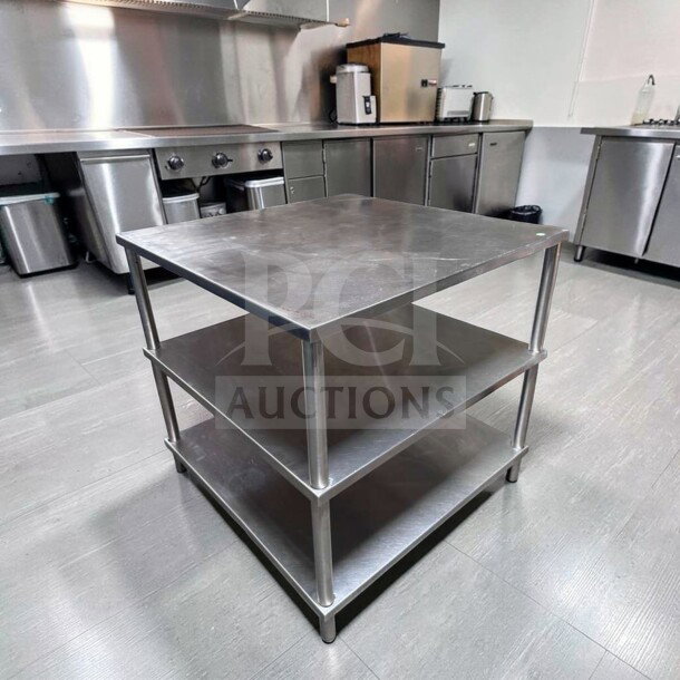 34" x 34" stainless steel commercial work table with two shelves, heavy-duty, superior condition, SST-S-WT-0823.