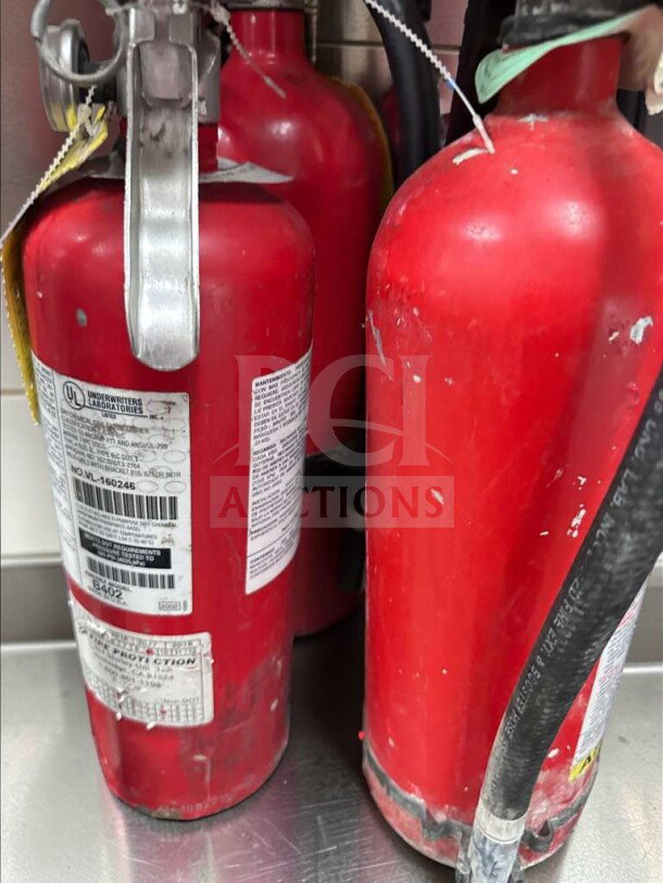 Commercial 5 lb ABC fire extinguishers, UL listed, 2A:10B:C rating, good condition, for restaurant use, visible labels.