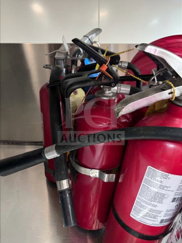 Prime condition 5 lb ABC fire extinguishers with 2A:10B:C rating, by Commercial Fire Protection, UL listed for restaurant use.