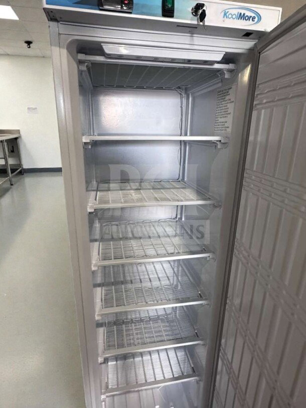 KoolMore KM-FMD12WH commercial reach-in freezer, 12 Cu. Ft., white, five adjustable wire shelves, ETL & UL listed, excellent condition.