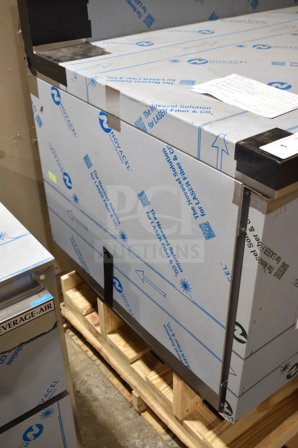 Brand new Alto Shaam QC3-20 57" quickchiller with protective wrapping, showing minor shipping scratches.