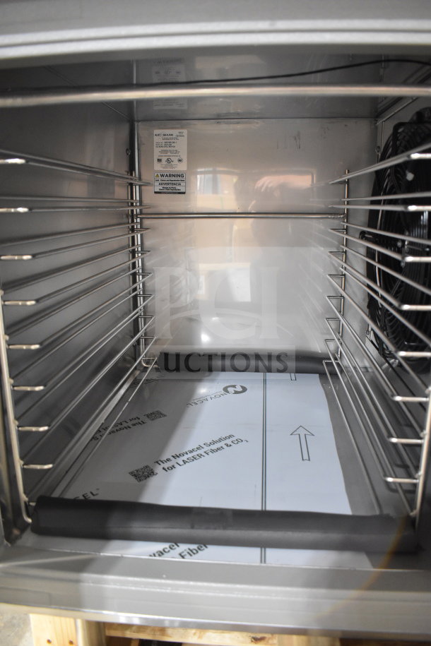 Alto Shaam QC3-20 Quickchiller, stainless steel interior, multiple shelves, visible model and warning labels, brand new condition.