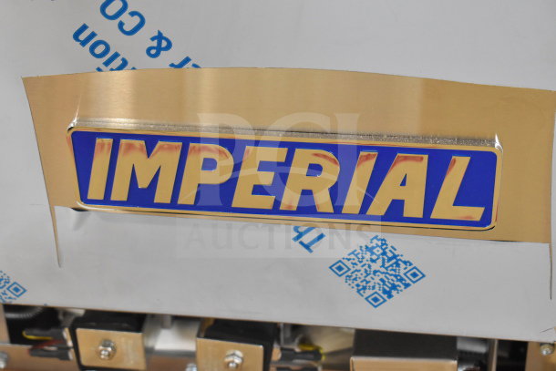 Brand new Imperial Range Pro Series IR-6-G24-CC natural gas range. Features 6 burners, 24" griddle, 2 convection ovens, 292,000 BTU. Scratch and dent condition shown.