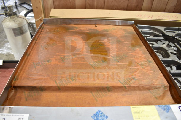 Brand new Imperial Range Pro Series IR-6-G24-CC with 6 burners, 24" griddle, and 2 convection ovens. Scratch and dent condition.