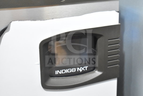 Brand new Manitowoc IYT0420A-161 Indigo NXT ice machine, 460 lb capacity, visible control panel; scratch on casing.