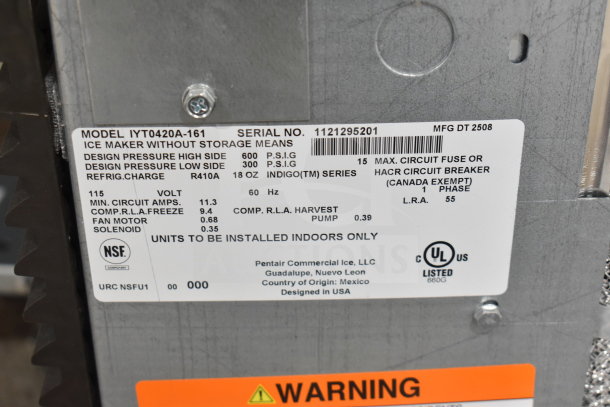 Brand new Manitowoc IYT0420A-161 ice machine label detailing specs: 460 lb capacity, 115 volts, R410A refrigerant.