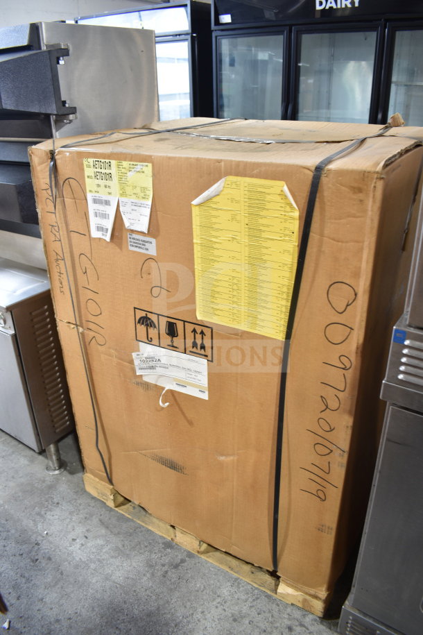 Bakers Pride AETG101R stainless steel commercial combi convection oven, new, scratch and dent, in box, on equipment stand.