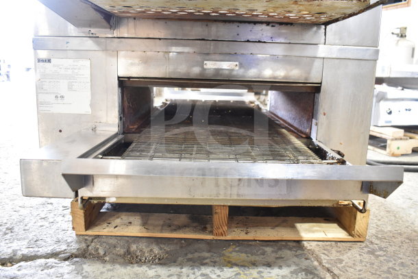 Two 2022 Middleby Marshall CTX DZ33T stainless steel commercial conveyor pizza ovens on casters, 208V, tested and working.