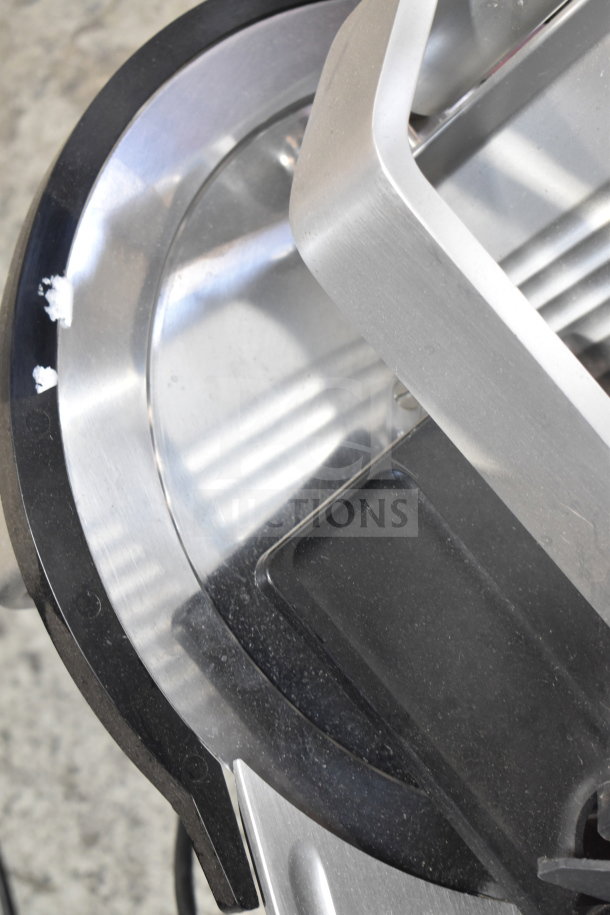 BRAND NEW 2025 Bizerba meat slicer with blade sharpener, visible scratch on blade edge. 120 volts, 1 phase.