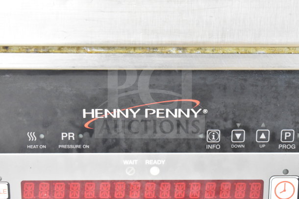 Henny Penny PFG-690 Computron 8000 pressure fryer control panel, showing brand and status indicators.