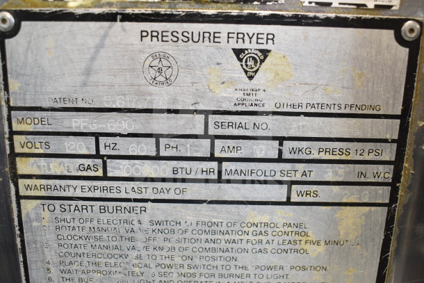 Henny Penny PFG-690 pressure fryer label. Model: PFG-690, 100,000 BTU, natural gas, Computron 8000, commercial casters.