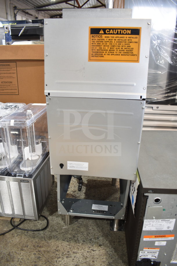 MainStreet 541FF40L 40 lb. stainless steel floor fryer, 90,000 BTU, liquid propane. New, minor scratches and dents. Caution label visible.