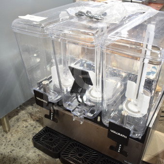 Brand new Vollrath VBBE3-37-S triple 5.28-gallon refrigerated beverage dispenser. Scratch and dent condition, 115V, 1 phase.