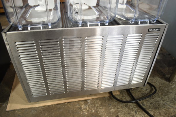 Brand new Vollrath VBBE3-37-S refrigerated beverage dispenser with three 5.28-gallon bowls and stirring paddle. 115V.