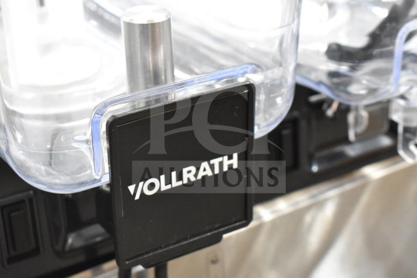 Brand new Vollrath VBBE3-37-S triple 5.28-gallon refrigerated beverage dispenser with stirring paddle, 115V, 1 phase.