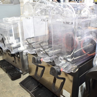 Brand new Narvon 378RBD5G3 triple 5-gallon refrigerated beverage dispenser, minor scratches, clear bowls, 115 volts.