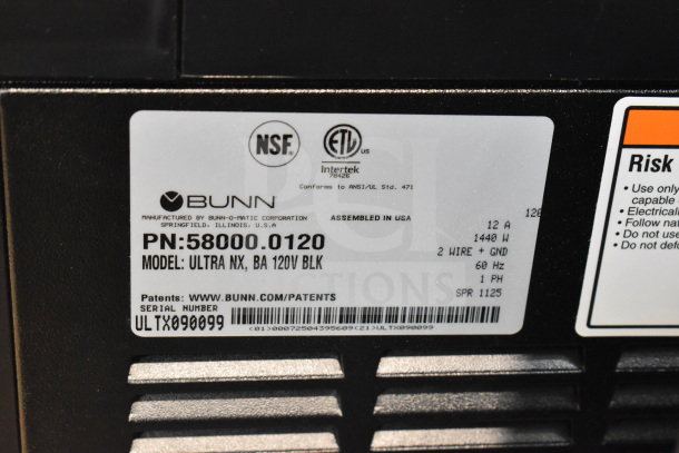 Close-up of Bunn 58000.0012 Ultra NX slushy machine label, shows model, serial number, voltage, and safety certifications.