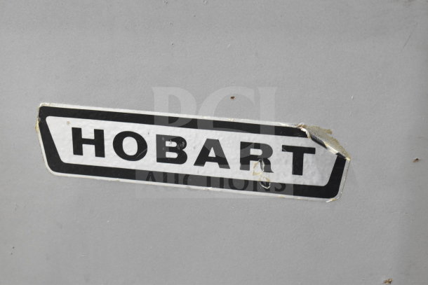 Hobart P660 commercial floor mixer, 60 quart, with bowl and dough hook, 208-240V, 3-phase, showing manufacturer label.